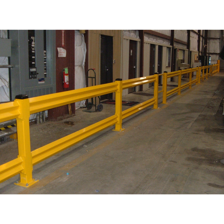 Save-ty Yellow Stand Guard lite duty guardrail along a warehouse wall