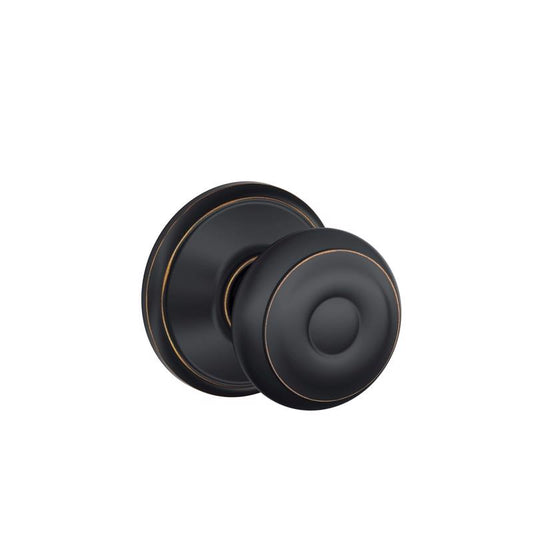 Schlage Georgian Aged Bronze Passage Door Knob 1-3/4 in.